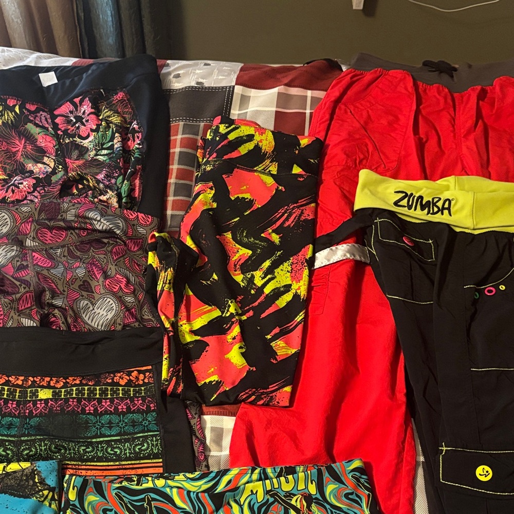 Lot of 11 pairs of Zumba Leggings- great condition 
Size Large